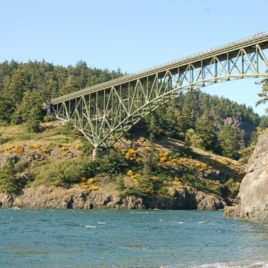 A bridge crossing Deception Pass over a body of water.