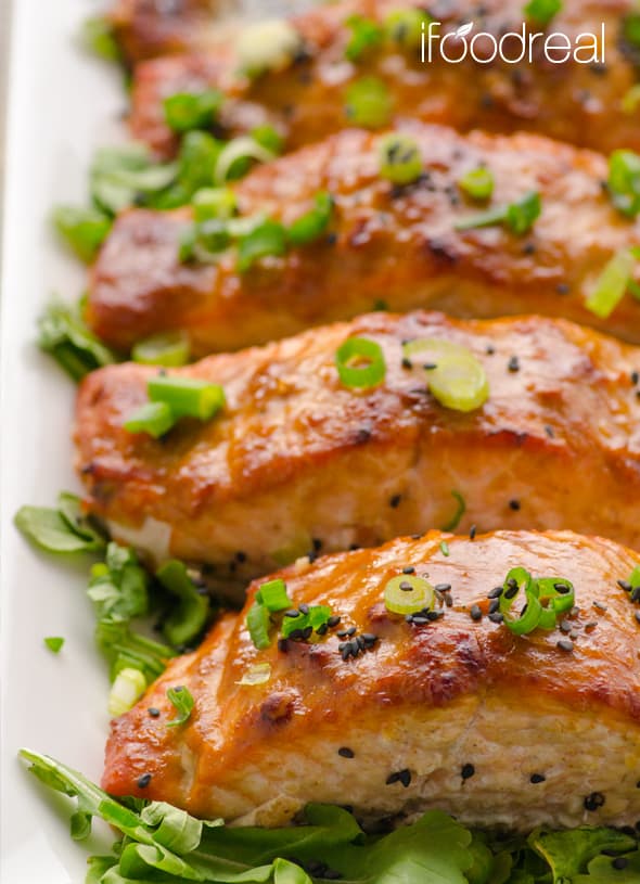Peanut Butter Salmon garnished with green onions and black sesame seeds