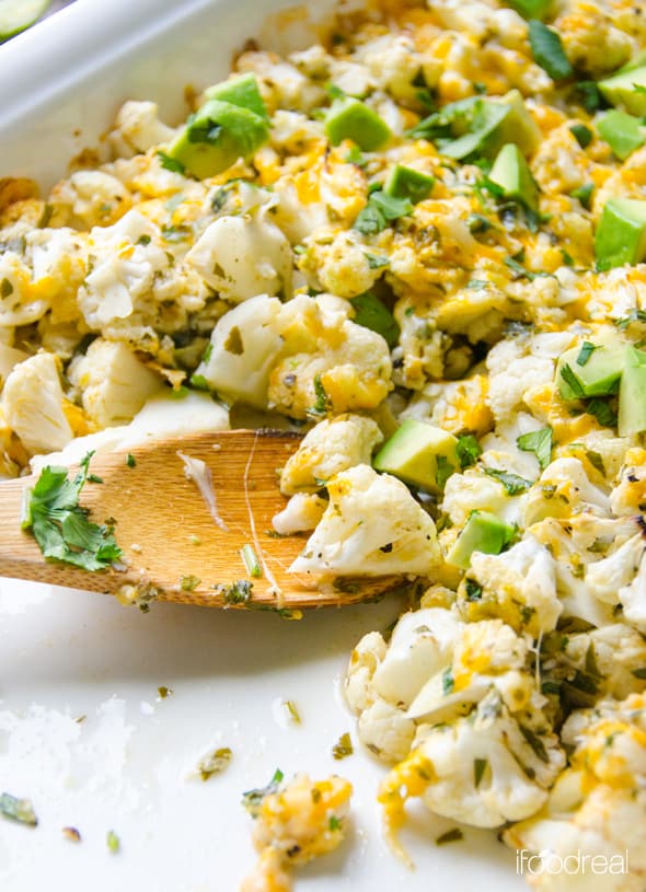 Close up of cauliflower with cilantro cheese and avocado.