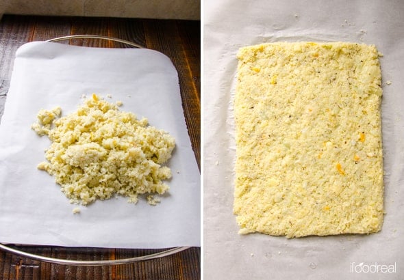 Cauliflower breadstick dough on parchment paper then rolled out onto the parchment.