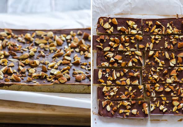 Homemade protein bars on parchment paper and then sliced.