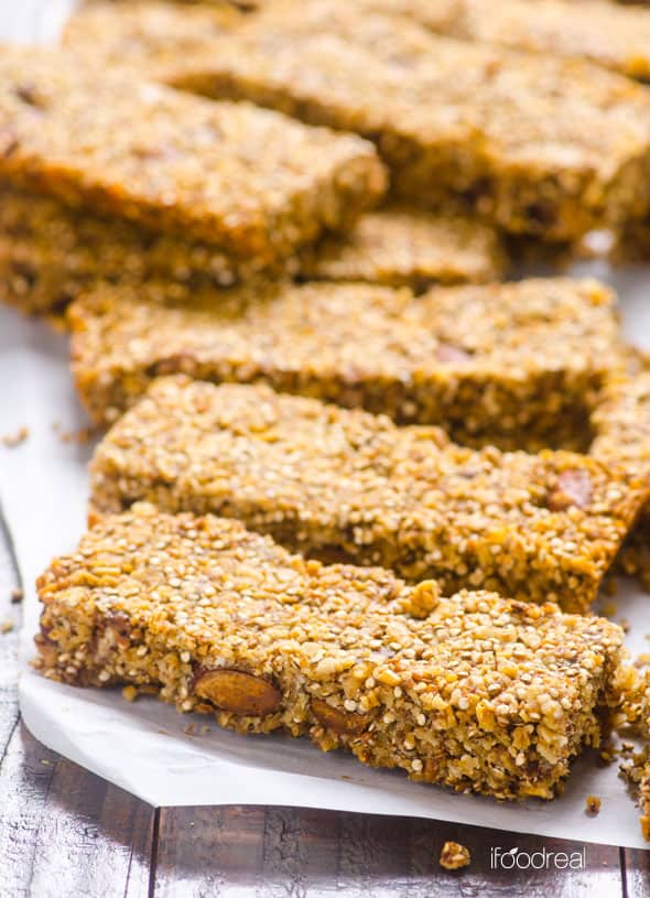 Close-up of quinoa granola bars on parchment paper.