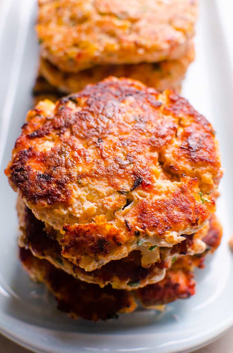 Pan Fried Stack of Salmon Burgers on a platter