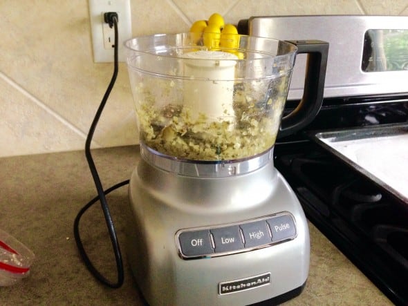 Capers, pickles, onion and garlic in a food processor.