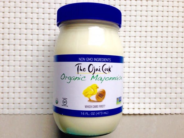 Jar of organic mayonnaise on a kitchen counter.