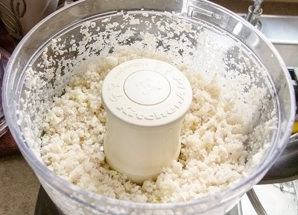 Rice cauliflower in a food processor.