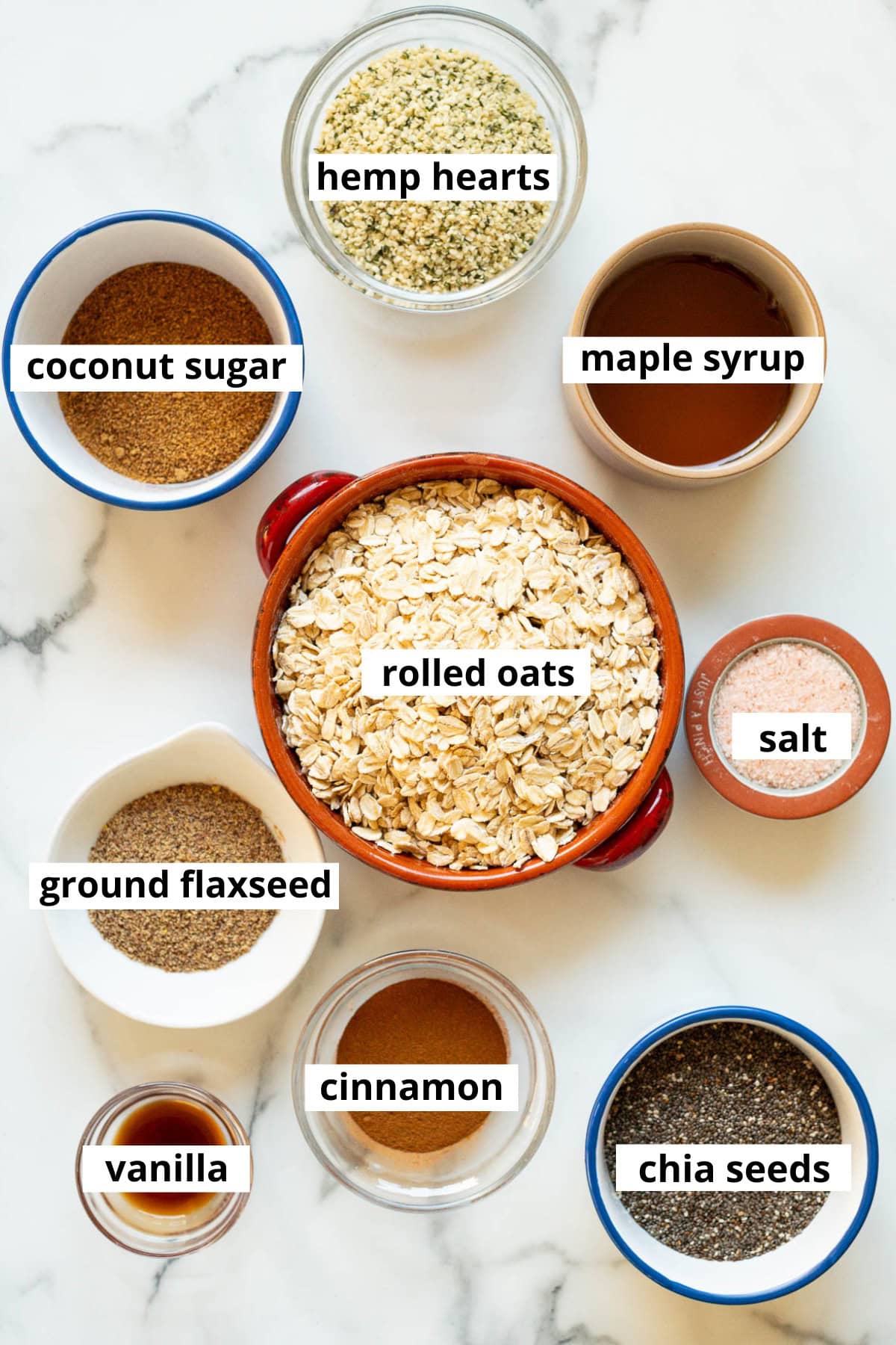 Rolled oats, hemp hearts, coconut sugar, maple syrup, cinnamon, salt, ground flaxseed, vanilla, chia seeds.