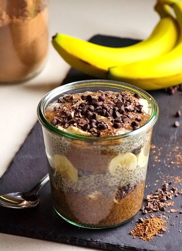 banana chia pudding in jar with bananas in background
