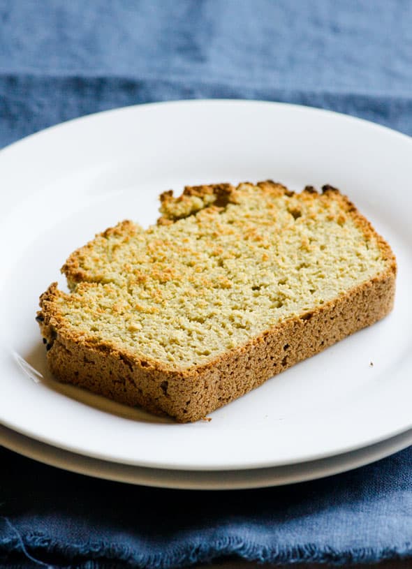 slice of quinoa bread; toasted on a plate