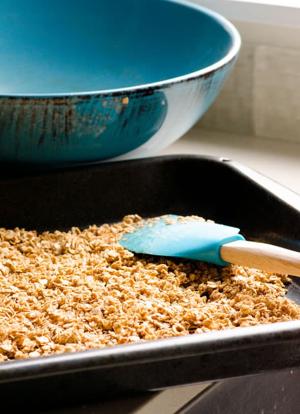 Healthy Homemade Cereal ingredients spread out on baking sheet