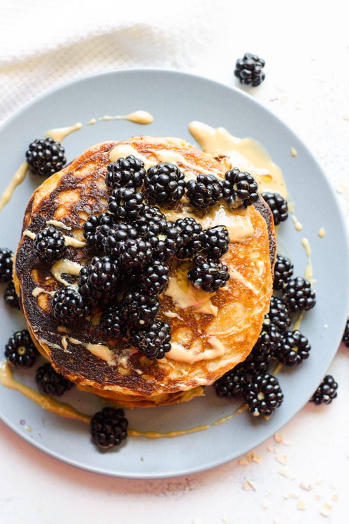 peanut butter protein pancakes with blackberries