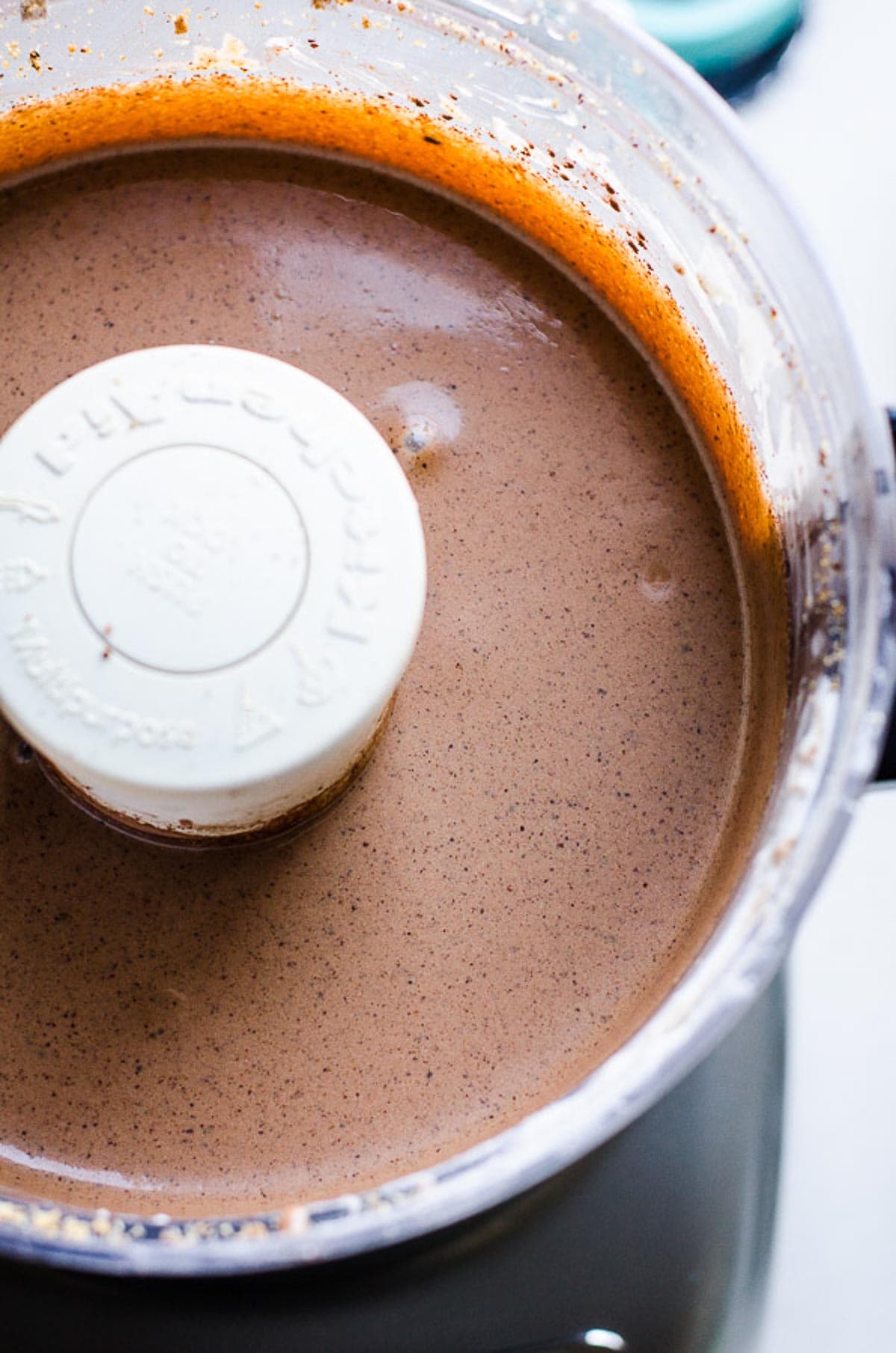 Ground hazelnuts, coconut milk, sugar, cacao powder, vanilla and salt in food processor.