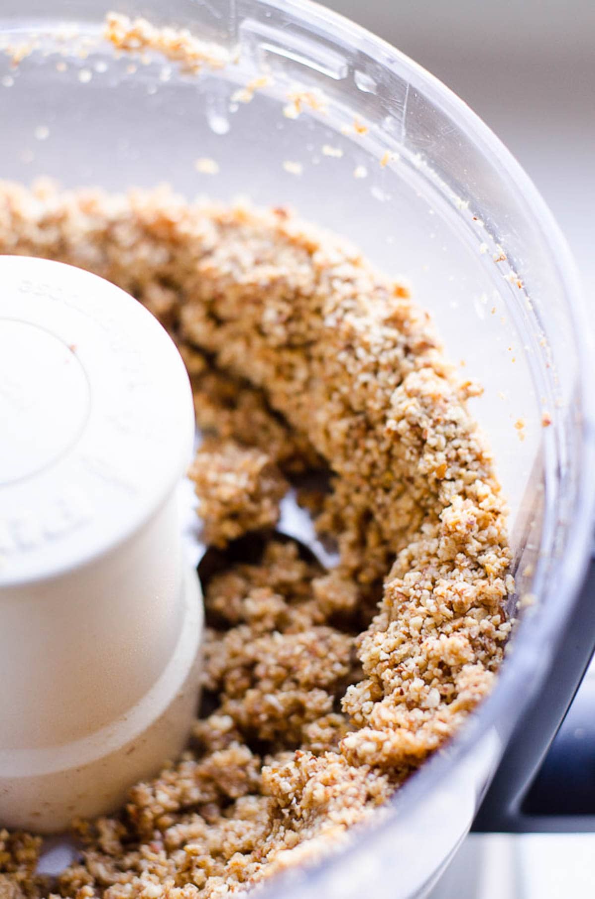 Ground almond and oats in food processor.