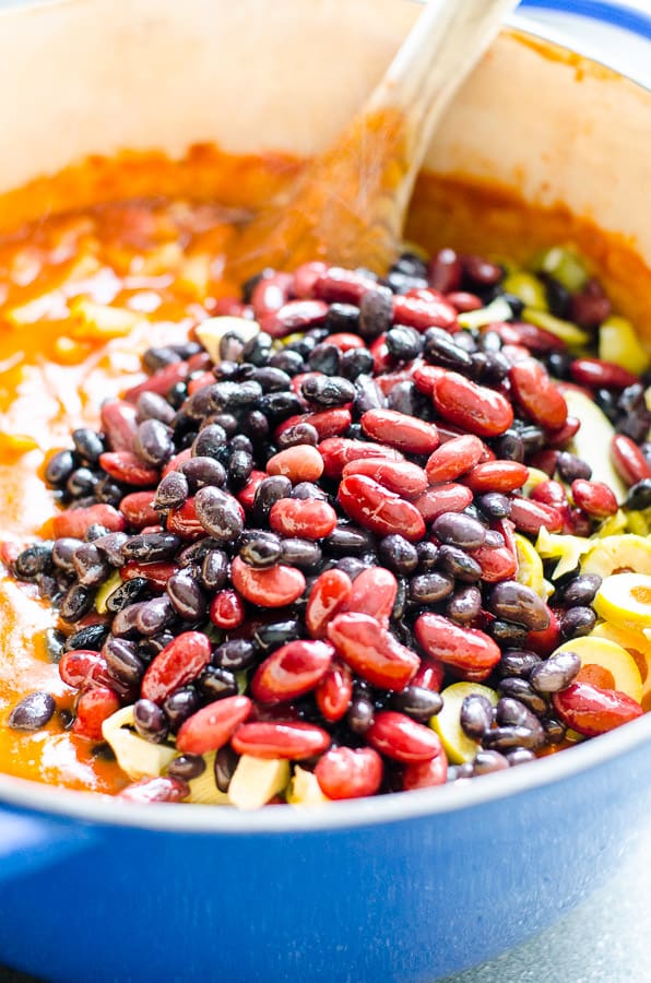 beans added to pot with pasta, tomatoes, veggies