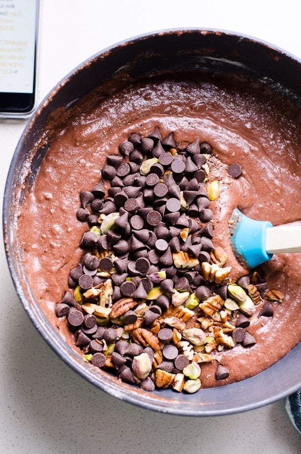Healthy Chocolate Bread batter in bowl with nuts and chocolate chips