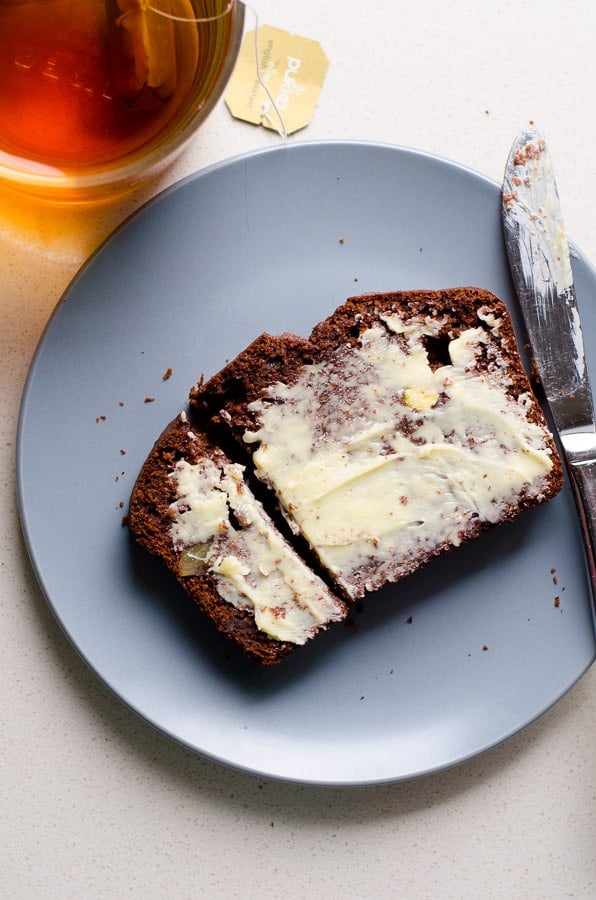Slice of healthy Chocolate Bread on plate with butter