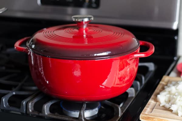 Red pot on the stove.