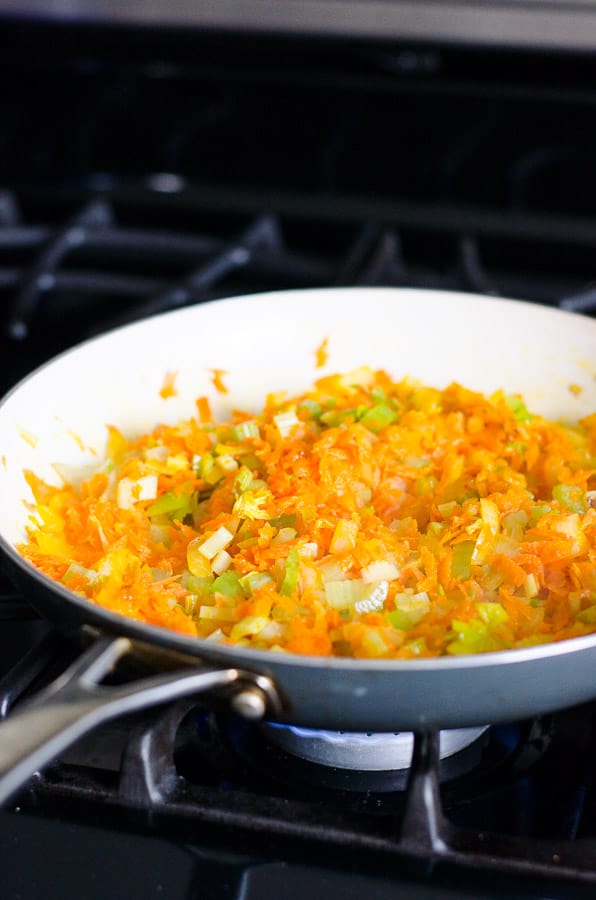 sauteing onions, celery and carrots on skillet