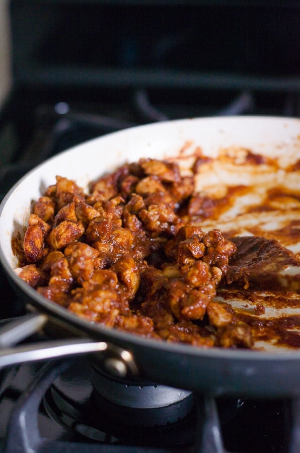 BBQ chicken on skillet for oatmeal pizza crust topping.