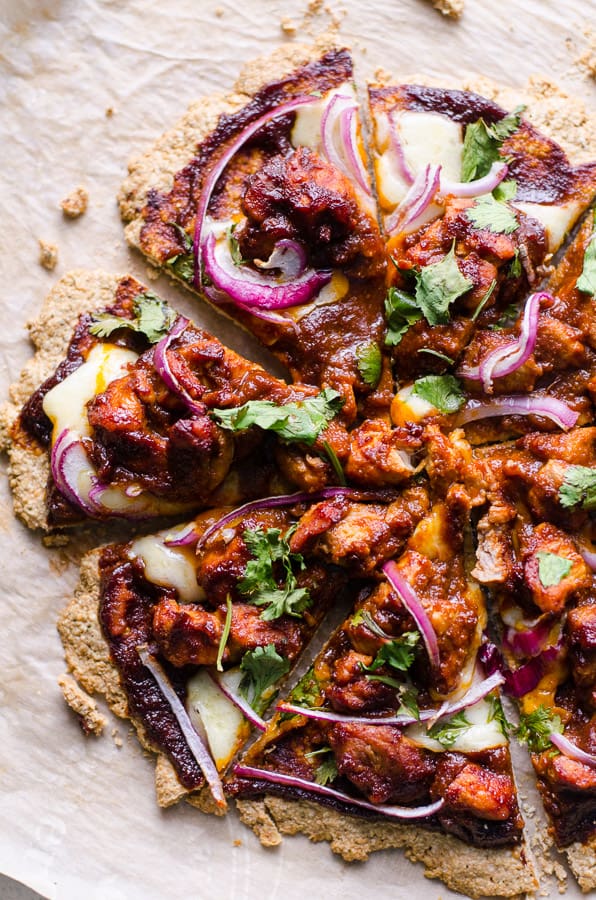Oatmeal pizza crust with barbecue chicken, red onions, cheese and cilantro.