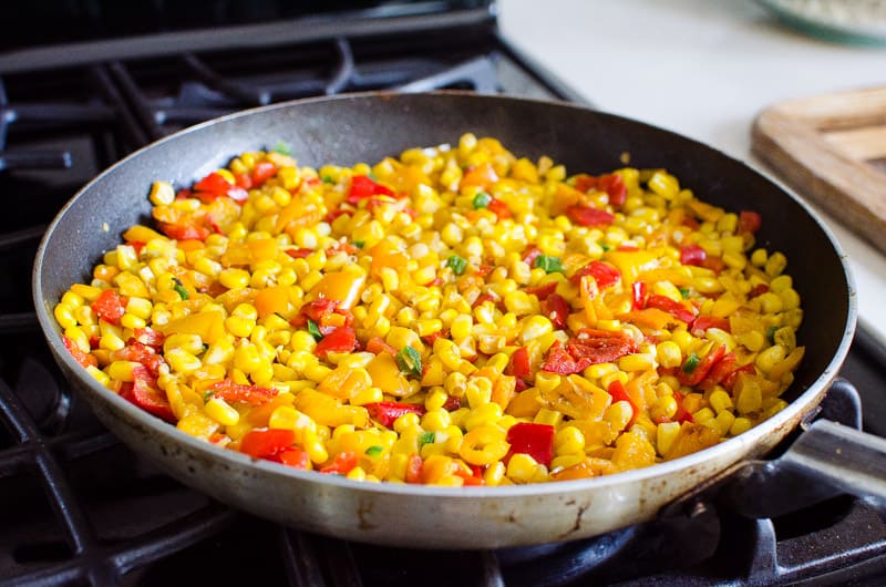 sauteed corn and veggies in a skillet