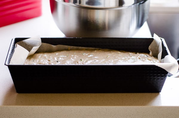 Batter in long loaf pan lined with parchment paper.