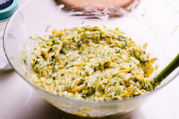 Final zucchini quiche mixture in mixing bowl.