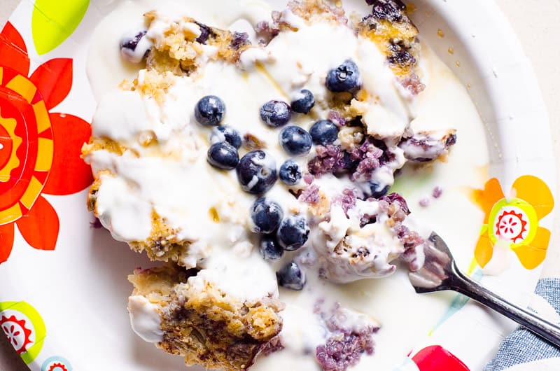 quinoa breakfast bake on a plate with yogurt