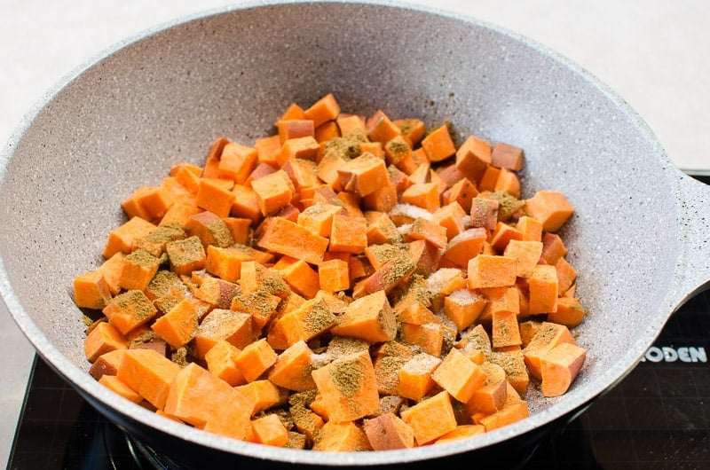 sweet potatoes cubed in skillet