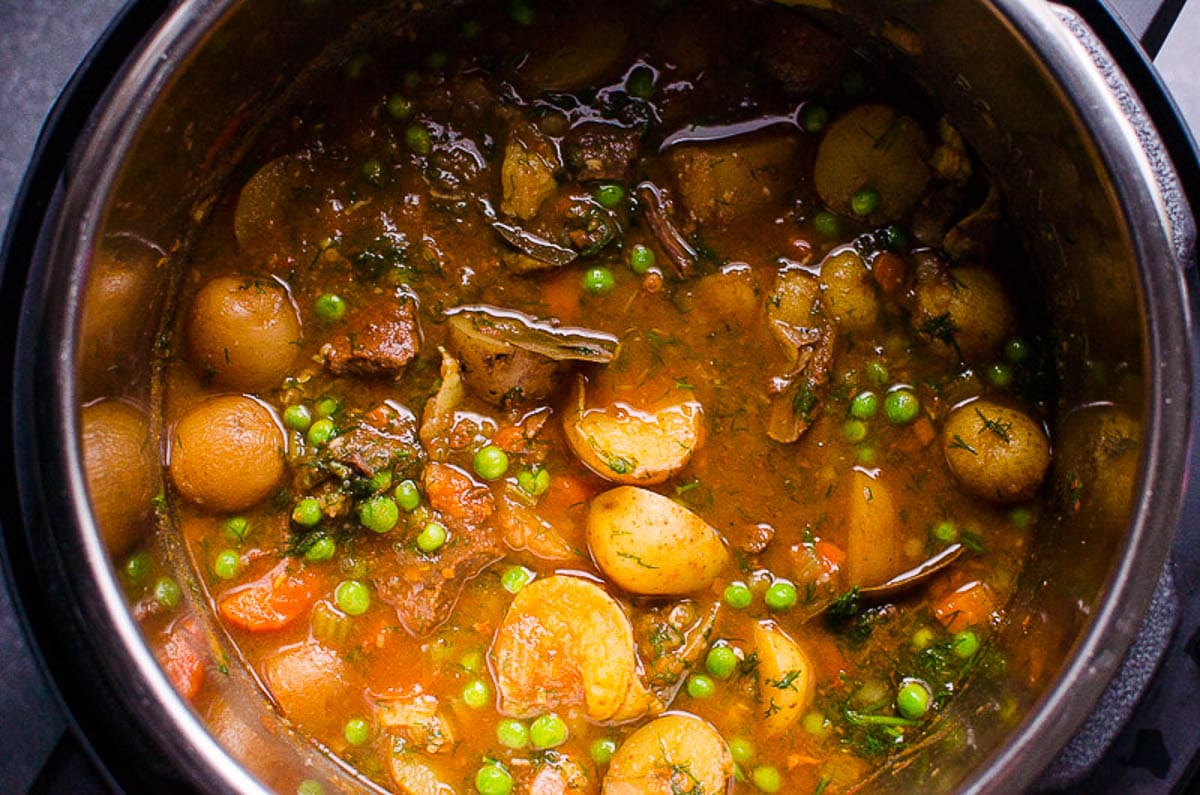 Instant Pot beef stew in pressure cooker pot.