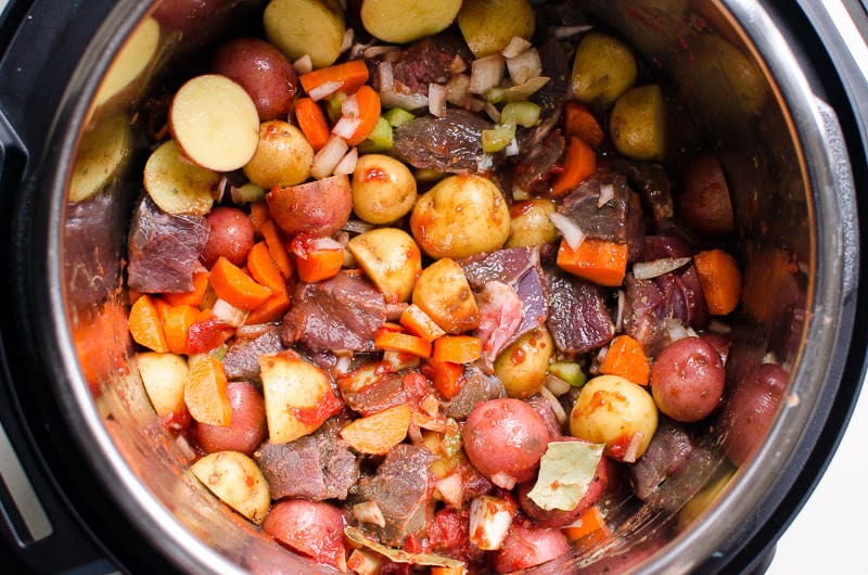 Instant Pot beef stew in pressure cooker pot.