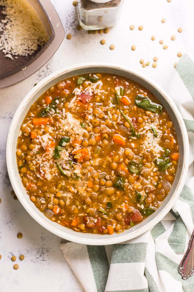 Instant Pot lentil soup with spinach served in a bowl.