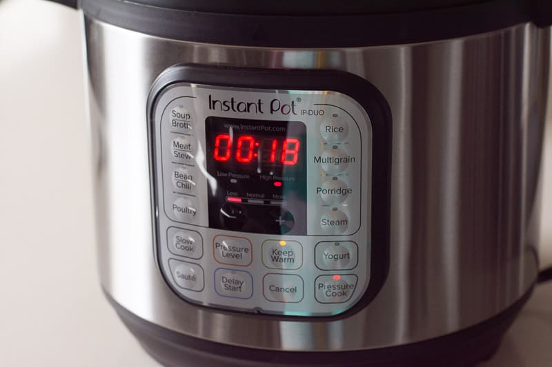 Instant Pot display showing 18 minutes to cook soup.