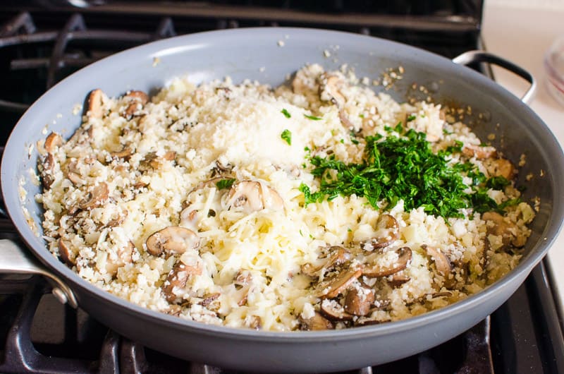 making cauliflower rice risotto with mushrooms