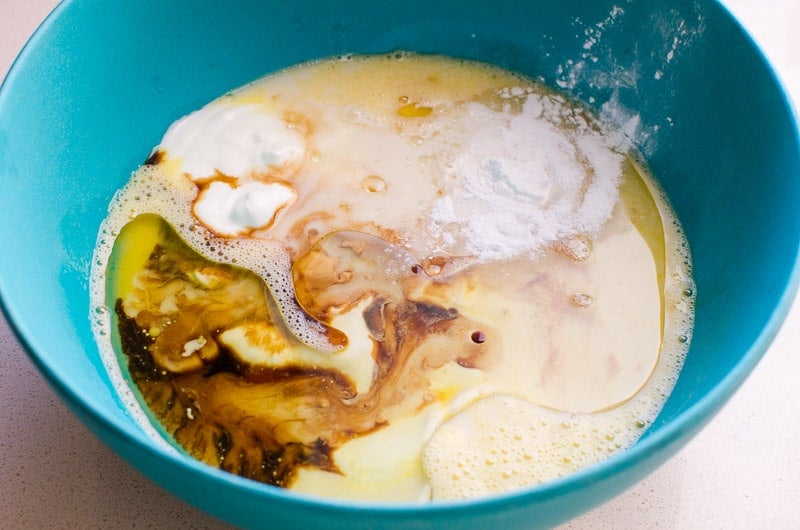 mixing eggs vanilla milk yogurt
