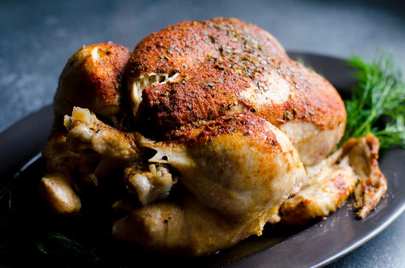 instant pot frozen whole chicken served on a platter