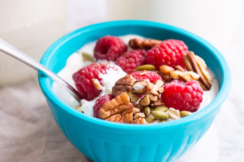 instant pot yogurt in bowl with granola and berries