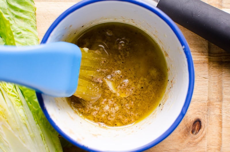 mixing garlic and anchovy paste in small bowl.
