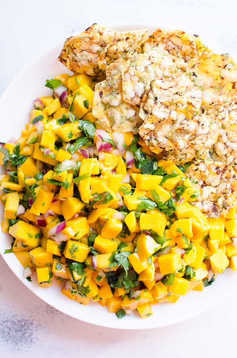 Mango salsa with cilantro and red onion and served with chips