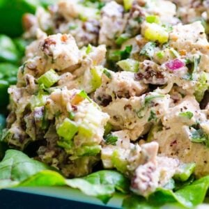 Healthy chicken salad served on lettuce leaves.