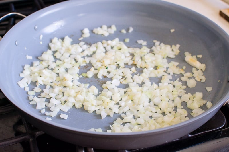 sauteing diced onions on skillet