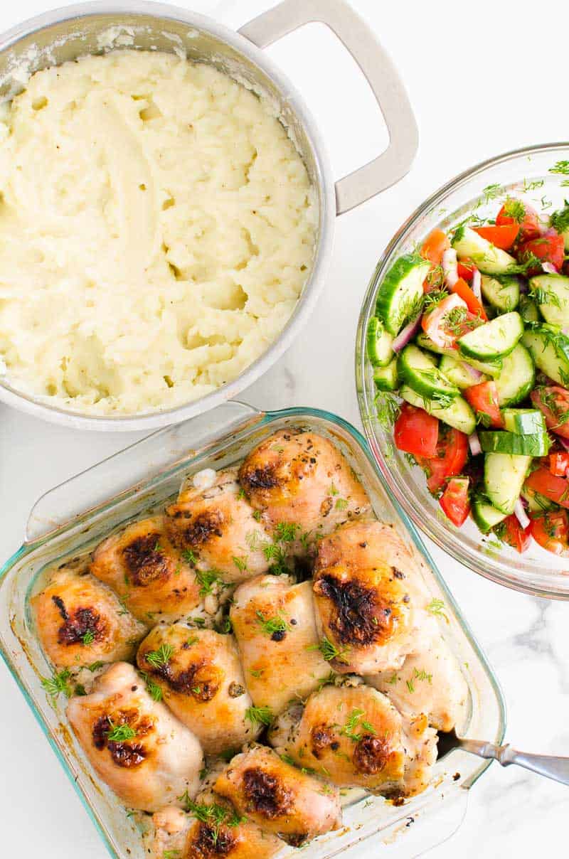 baked chicken, mashed potatoes and cucumber tomato salad