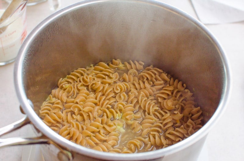 Pasta in large stockpot with liquids.