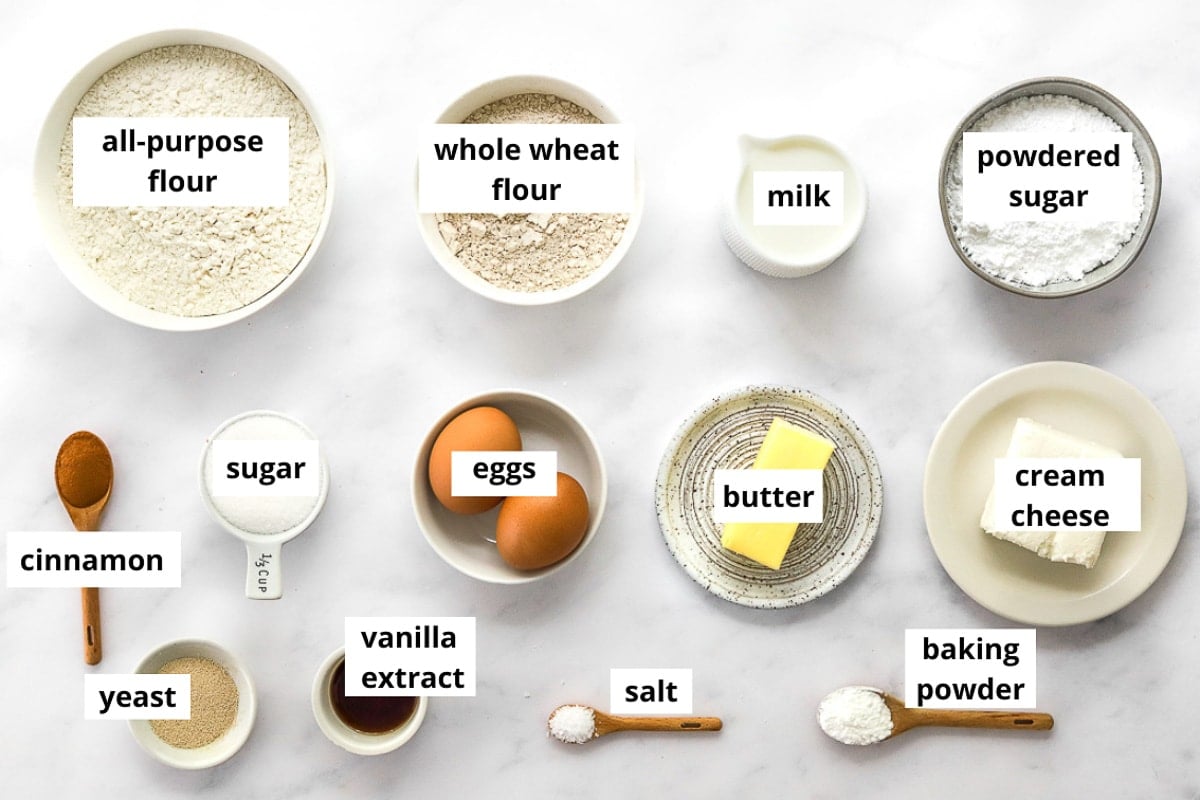 All-purpose flour, whole wheat flour, sugar, butter, yeast, cinnamon, milk, powdered sugar, cream cheese, eggs, salt, baking powder, vanilla, yeast. 