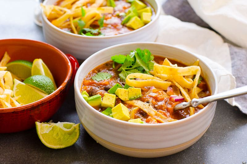 Two bowls of Instant Pot chicken tortilla soup.