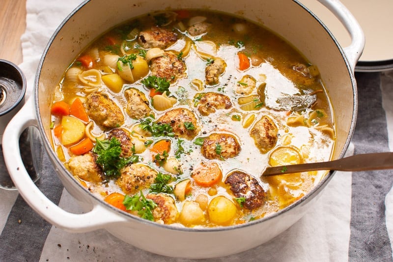 Turkey Meatball Soup in white pot with ladle