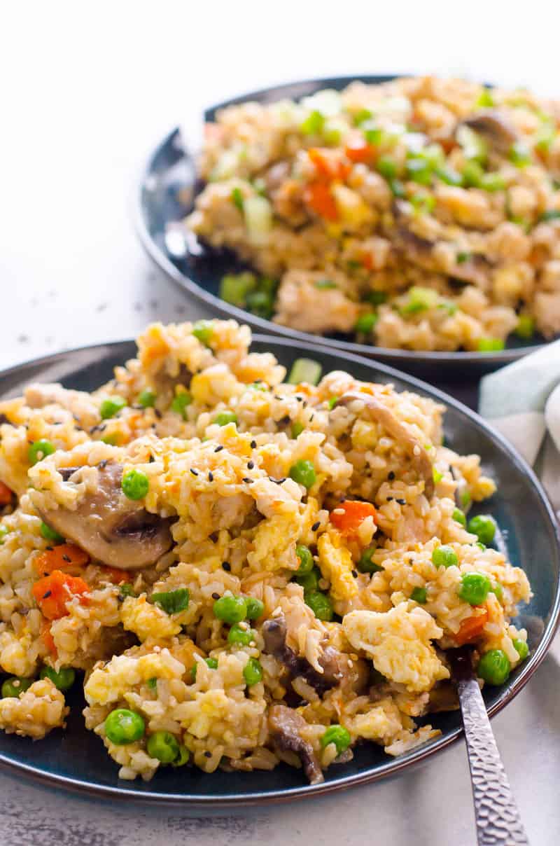 One pot fried rice in Instant Pot served on plates with fork