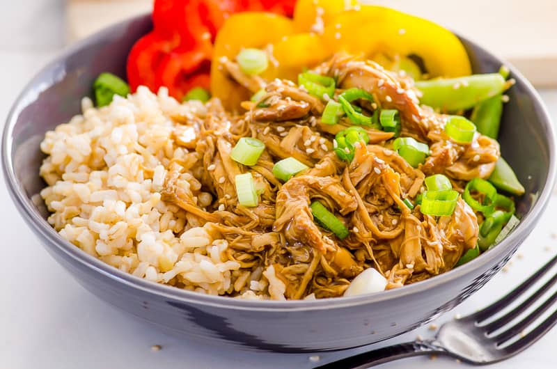 instant pot chicken recipe garnished with green onion and sesame seeds