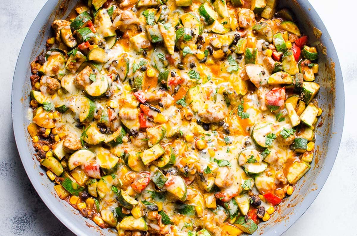 tex mex chicken and zucchini with cheese on top