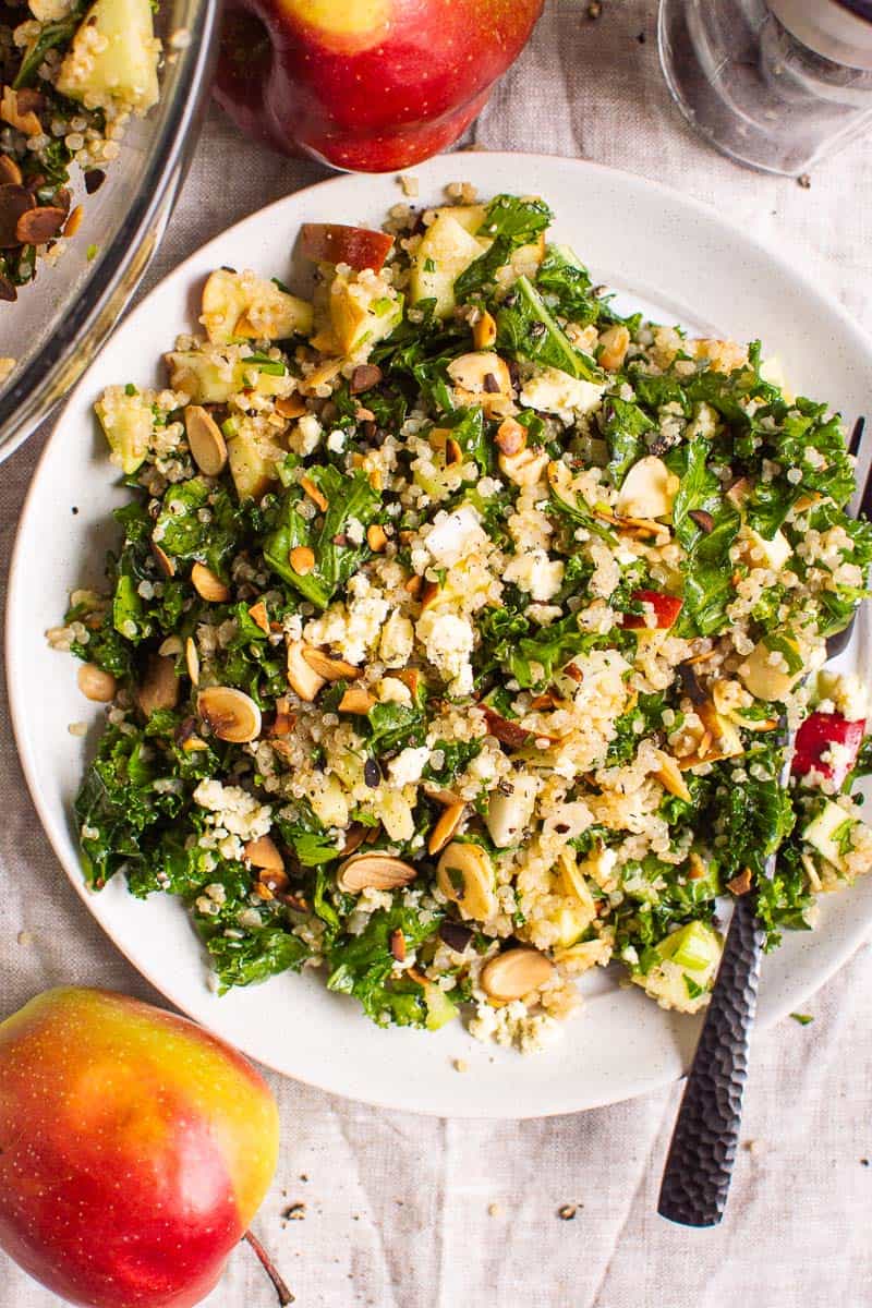 Kale and Quinoa Salad on a plate with fork 